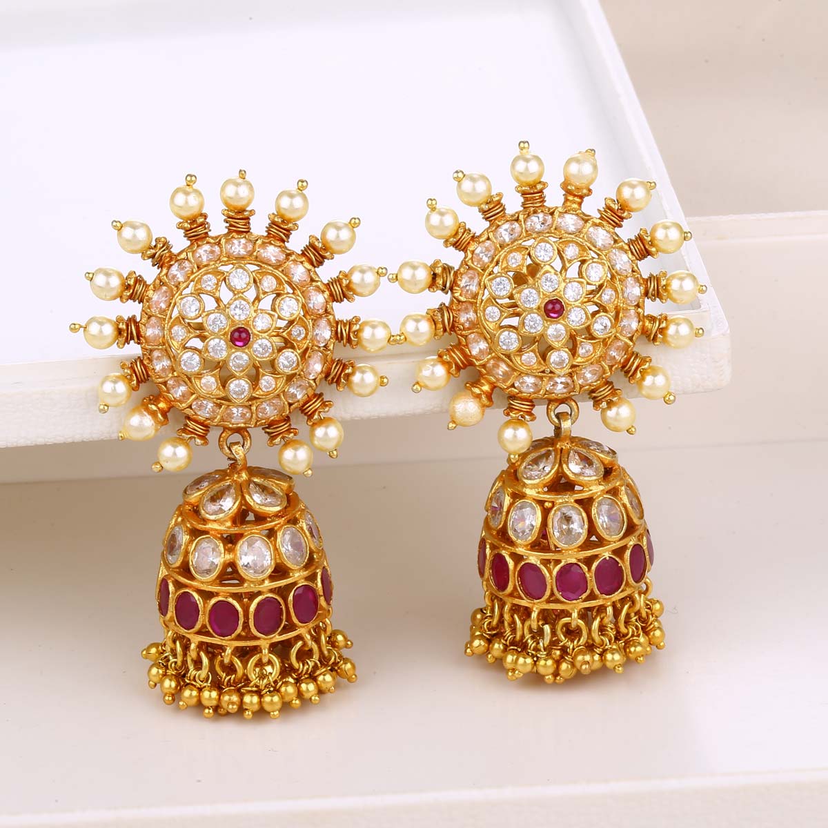 Gold stone deals jhumkas