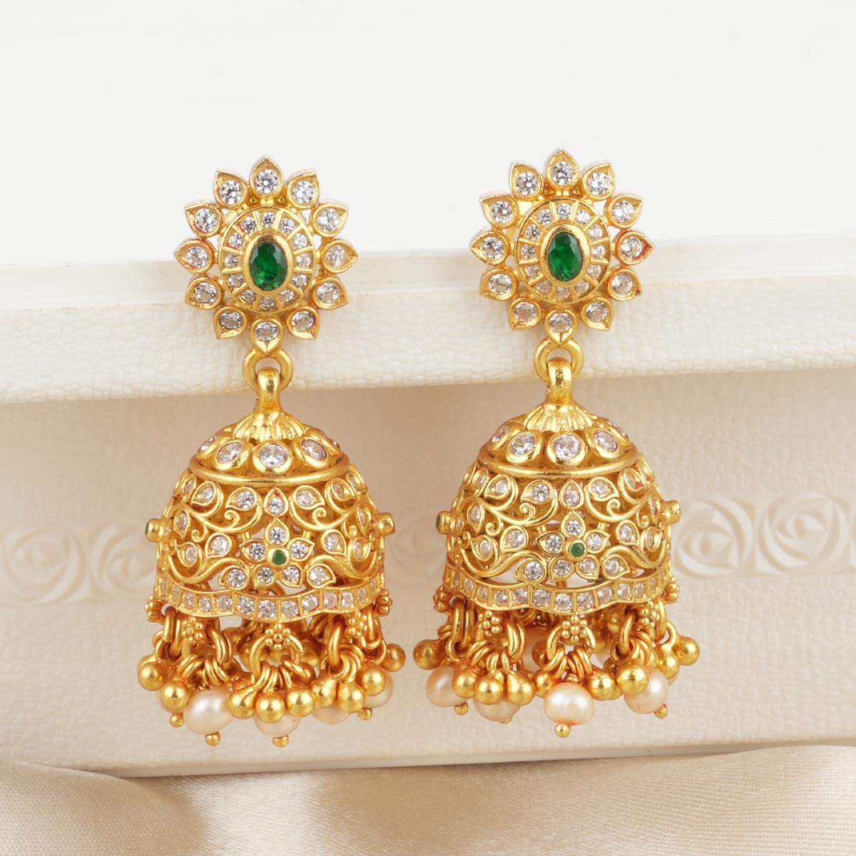 Plated Jhumka Earrings with Zircon Stone Embellishments