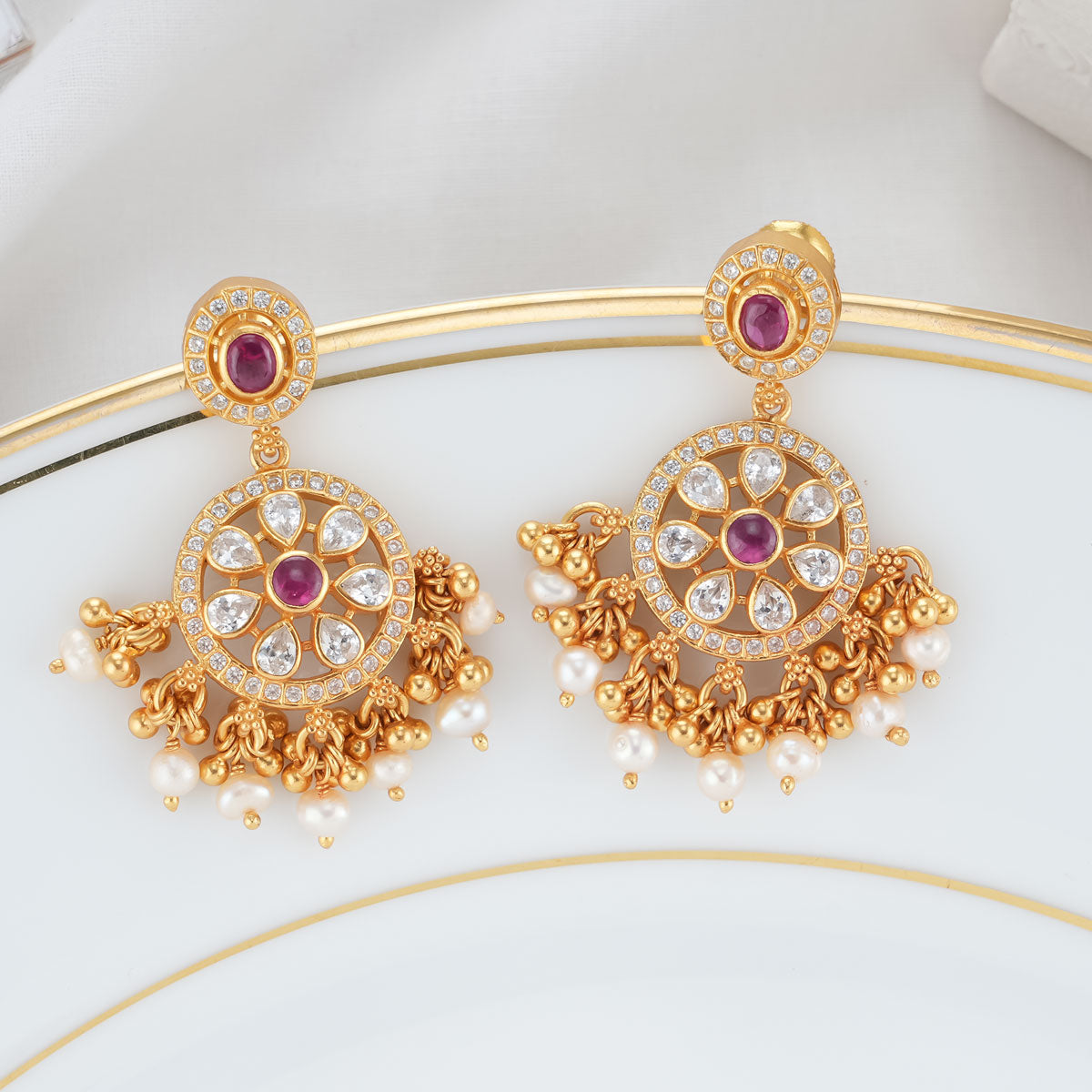 22K Gold Earrings studded with Pearls and Gem Stones