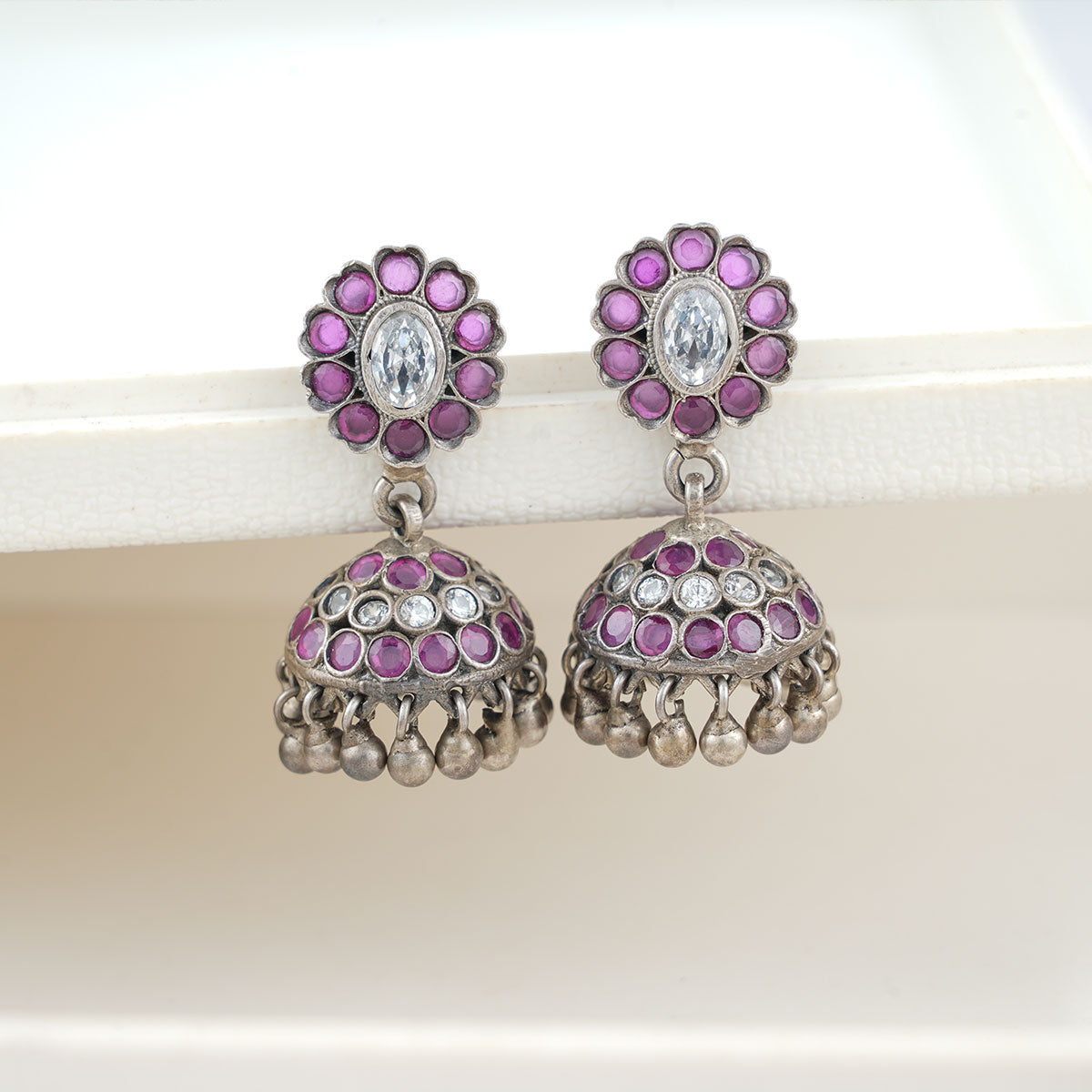 Woma Purple Austrian Stone Gold Plated Jhumka Earrings - 1318346B