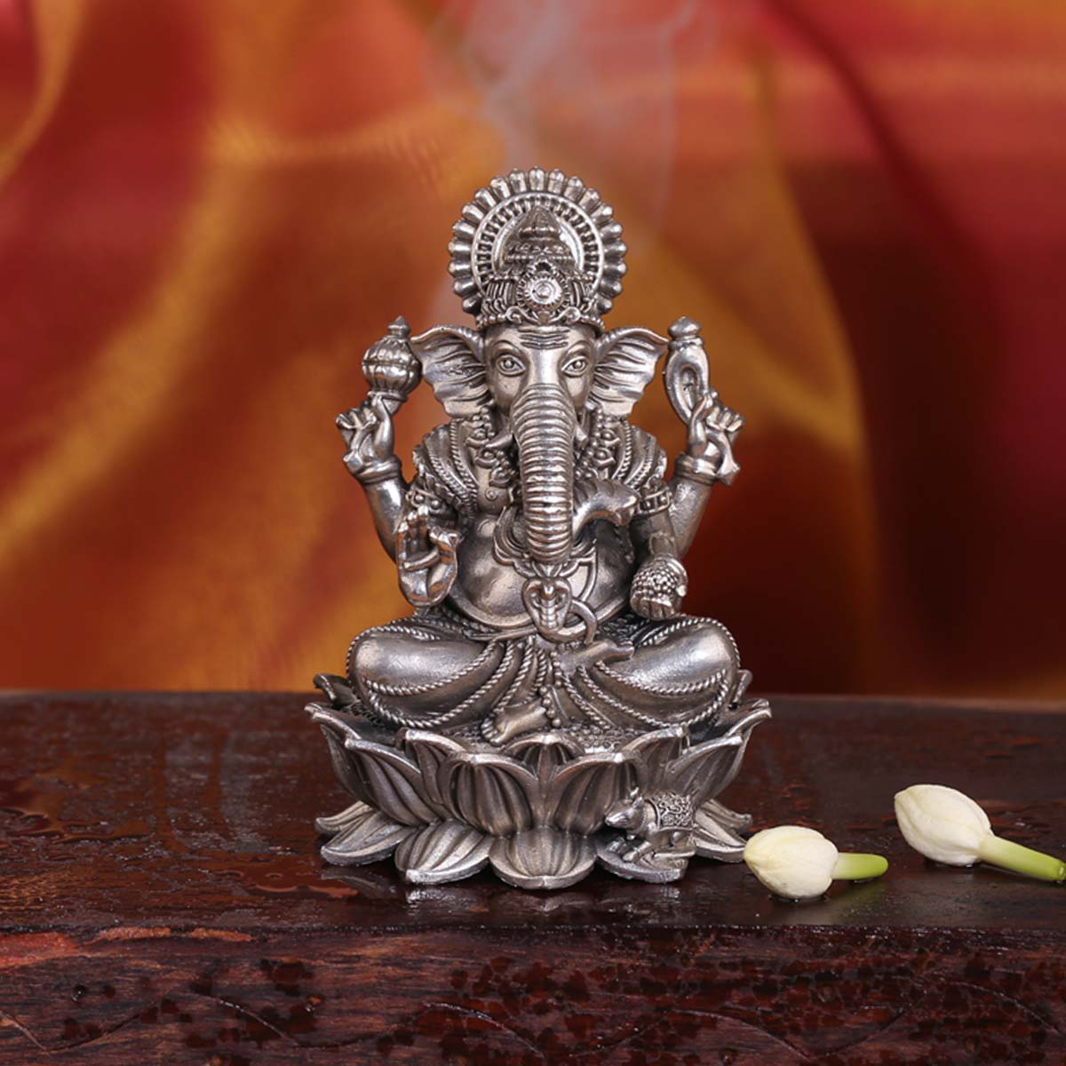 Silver ganesh laxmi deals murti price tanishq